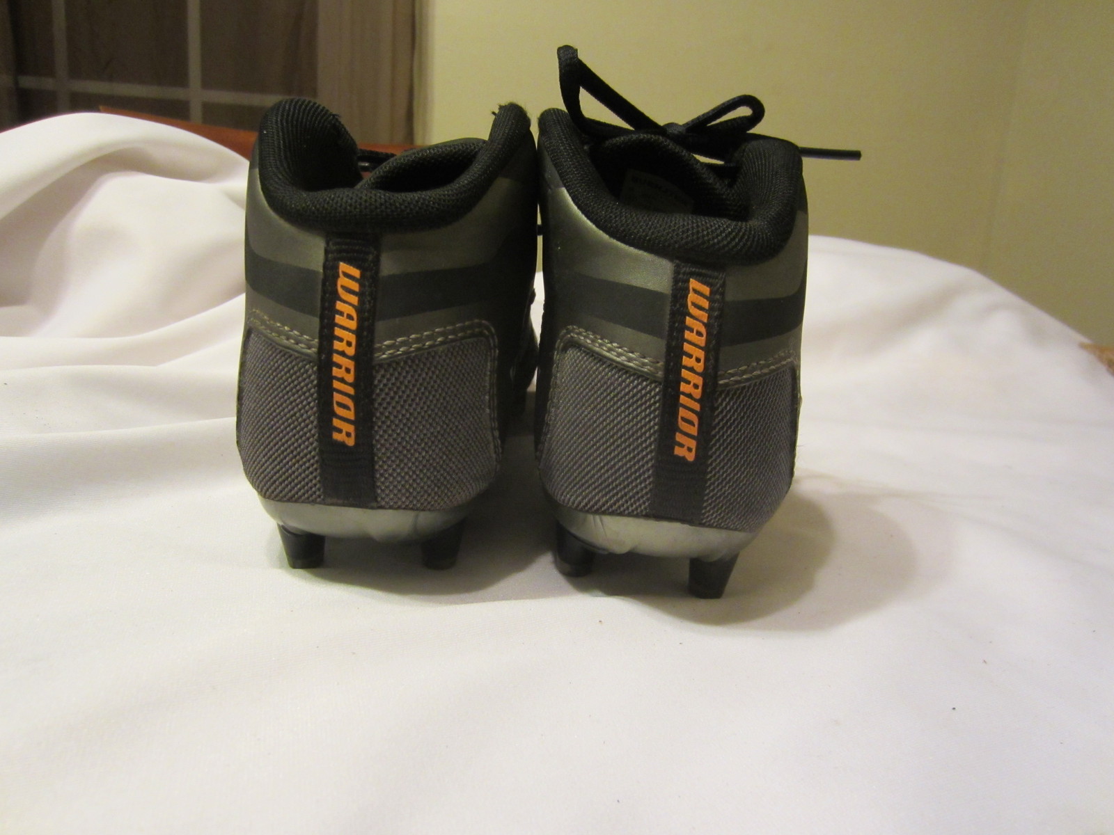 warrior burn 7.0 mid lacrosse cleats