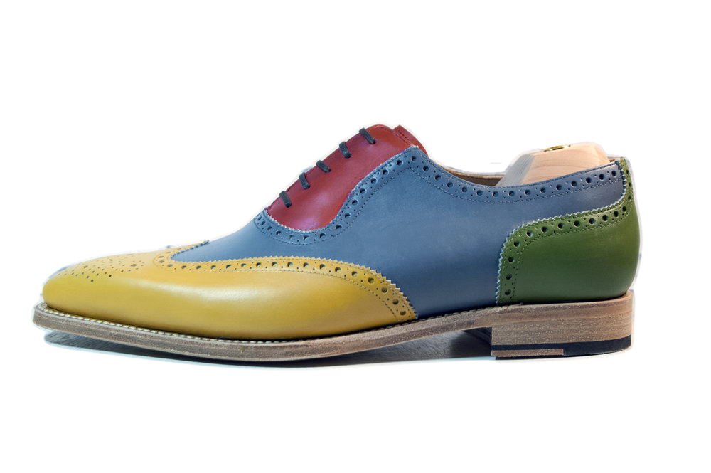 multi colored wingtip shoes