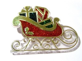 CHRISTMAS PIN PLASTIC SANTA&#39;S SLEIGH AND PRESENTS FAUX GLITTER BAKED IN ... - $9.50