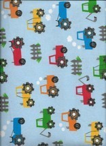 New A. E. Nathan Multi Color Tractors on Blue Flannel Fabric Sold bt Hal... - $3.96