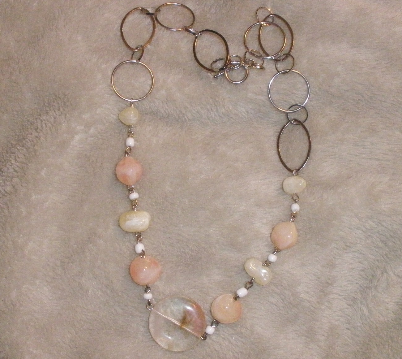 Avon necklace with beads and metal loops new - $9.00