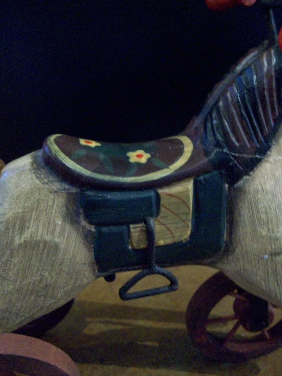 antique riding horse on wheels