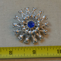 Vintage jewelry blue rhinestone silver tone round circle wheel flower brooch pin - $7.91