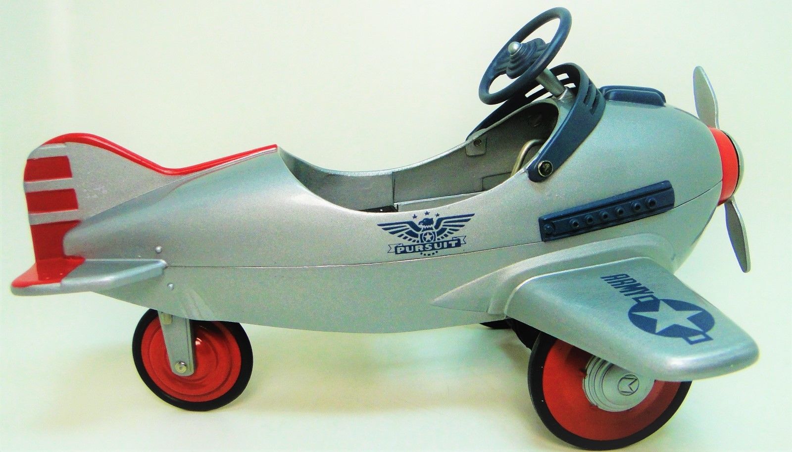 red metal pedal car