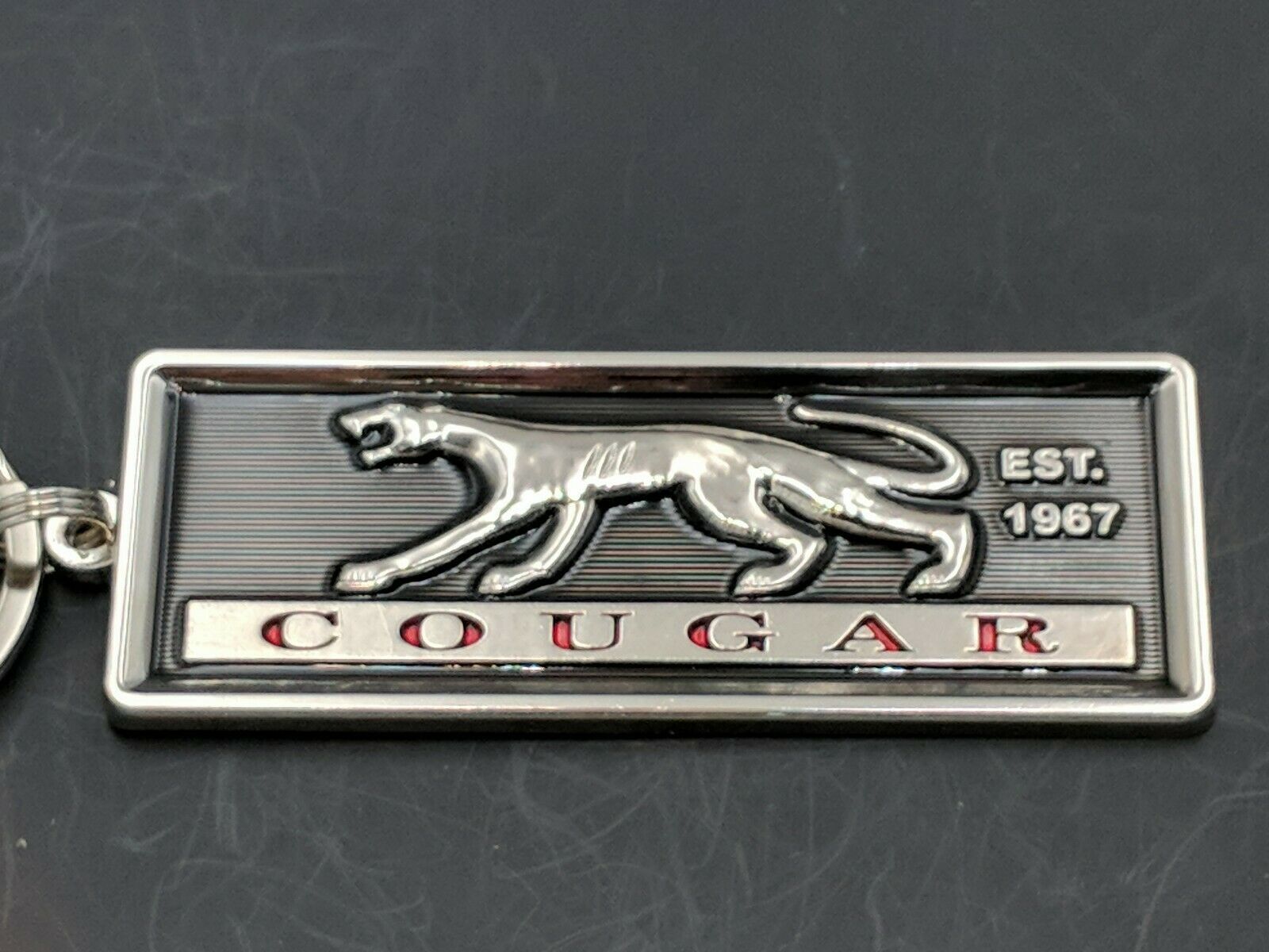 67-68 Mercury Cougar Headlight Door Emblem keychains/Backpack Jewelry. (K10)