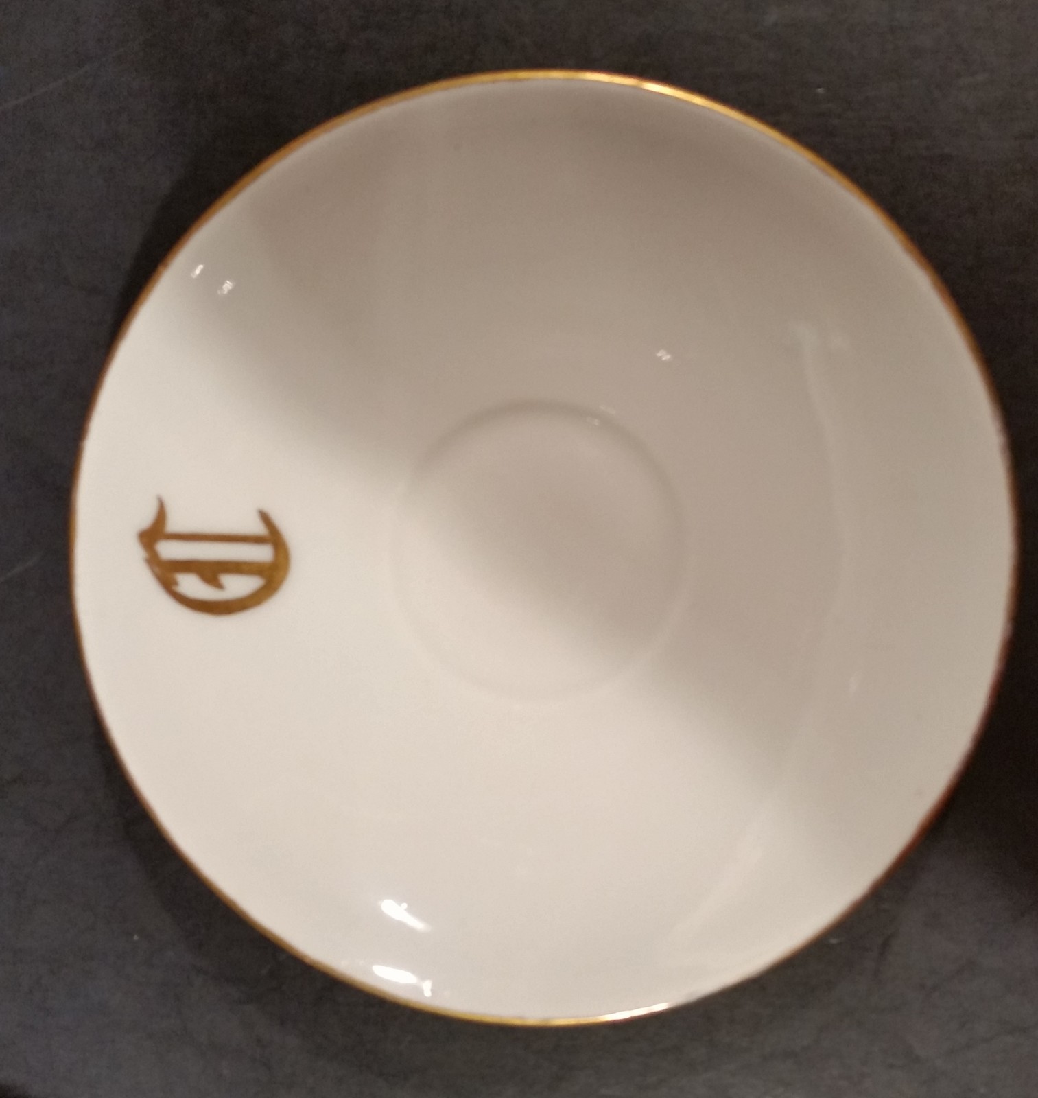 Limoges Gold Trim Cup and Saucer with “D” in gold on the saucer and