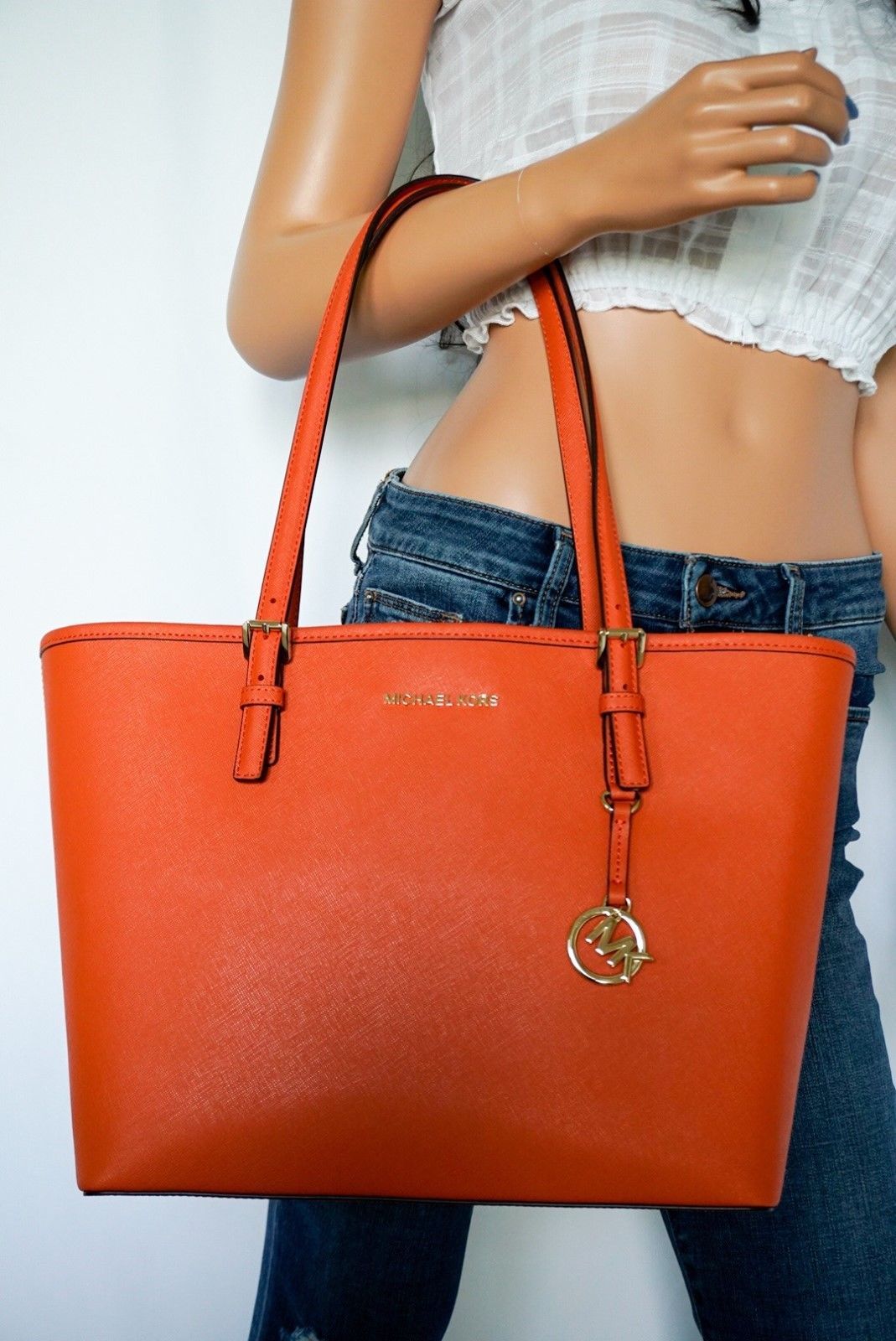 michael kors orange and white purse