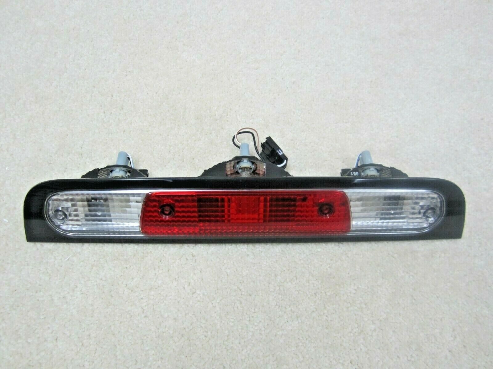 2019 2022 DODGE RAM 1500 OEM HIGH MOUNT REAR STOP LIGHT 68298380AG     57 