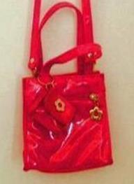 shiny red handbag