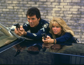 James Darren and Heather Locklear in T.J. Hooker pointing guns by police car - $69.99
