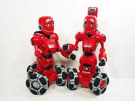 Pair of Red Tri-Bot Wow Wee Robots with Remote (C4B4*) - $79.99
