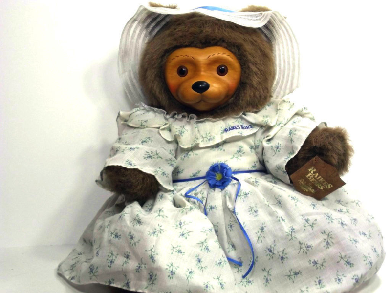 teddy bear with wooden face