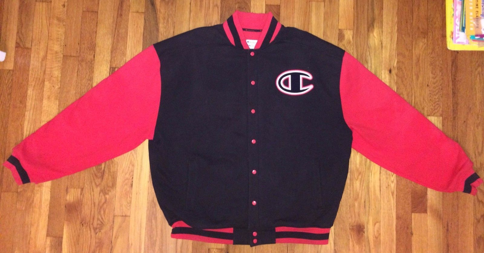 red and black champion jacket