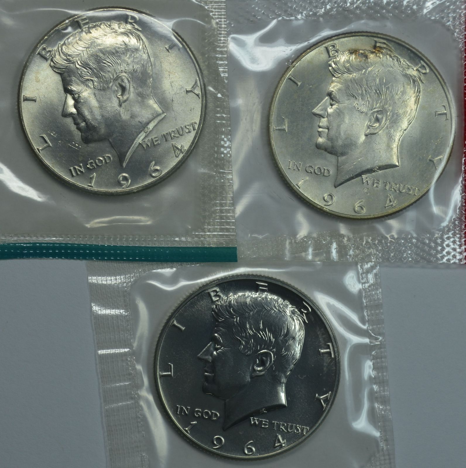 1964 P & D Kennedy silver half dollars and 1964 Kennedy proof in mint cello - $58.75