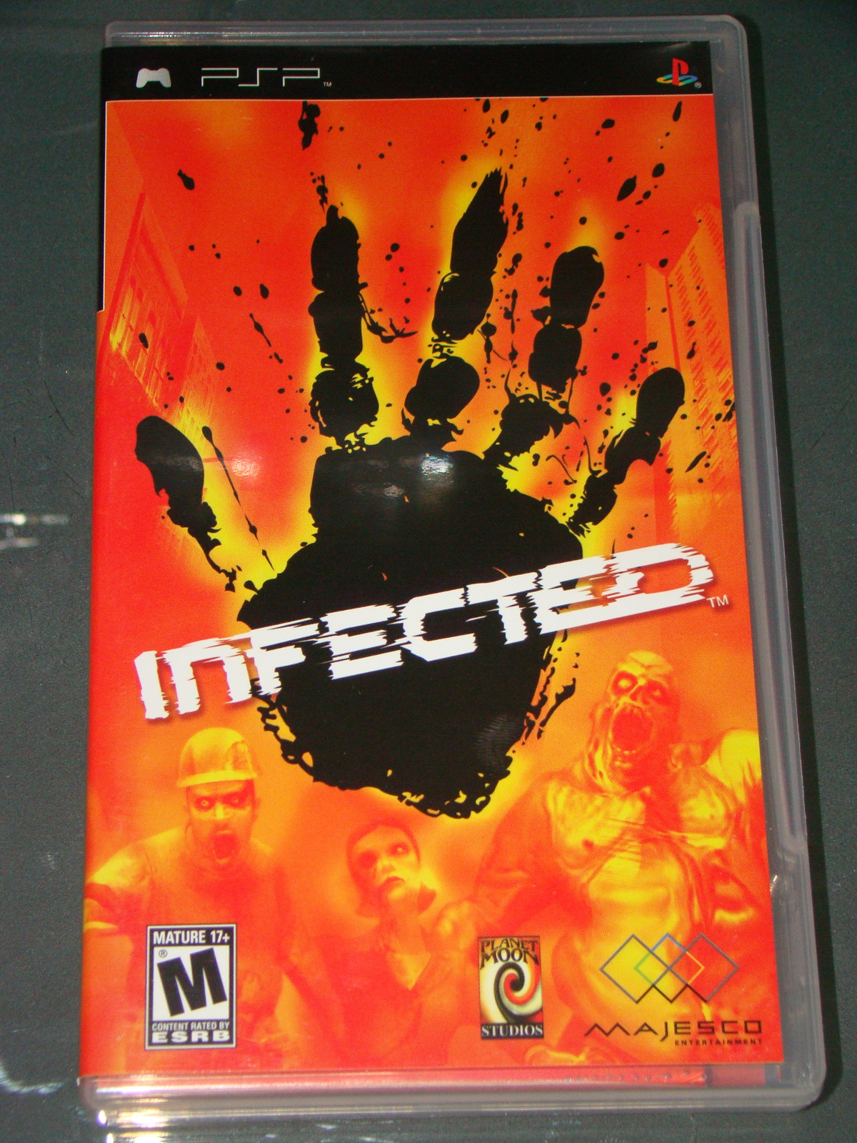 Sony PSP UMD Game INFECTED with Manual) Video Games