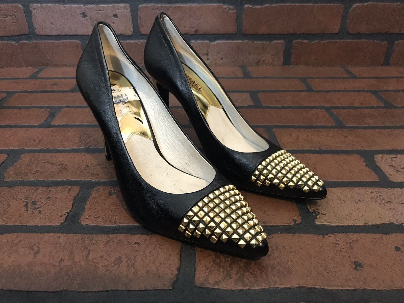Primary image for Michael Kors Heels Black Leather With Gold Cap Toe Studs Size 6.5