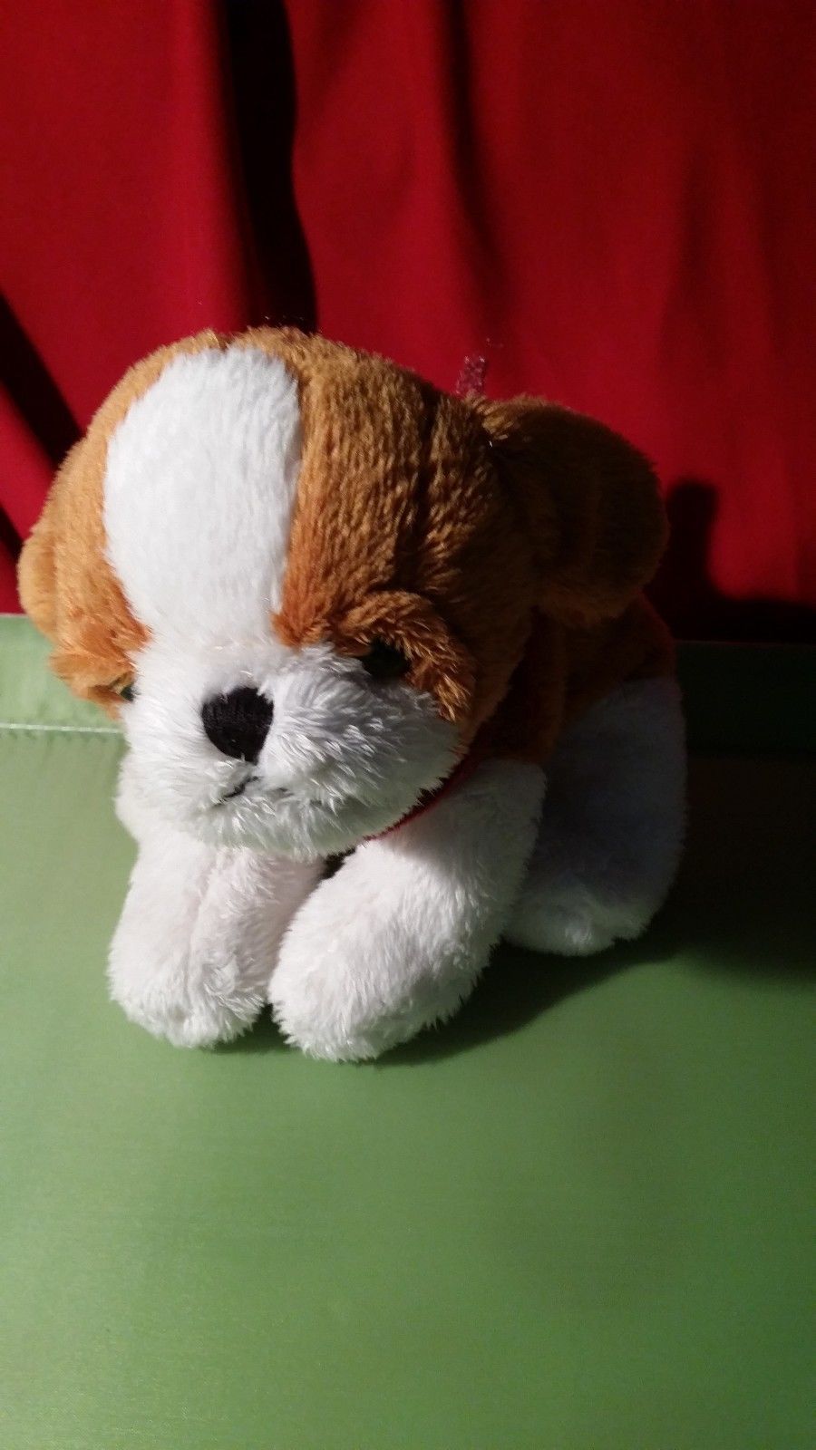 brown and white stuffed animal dog