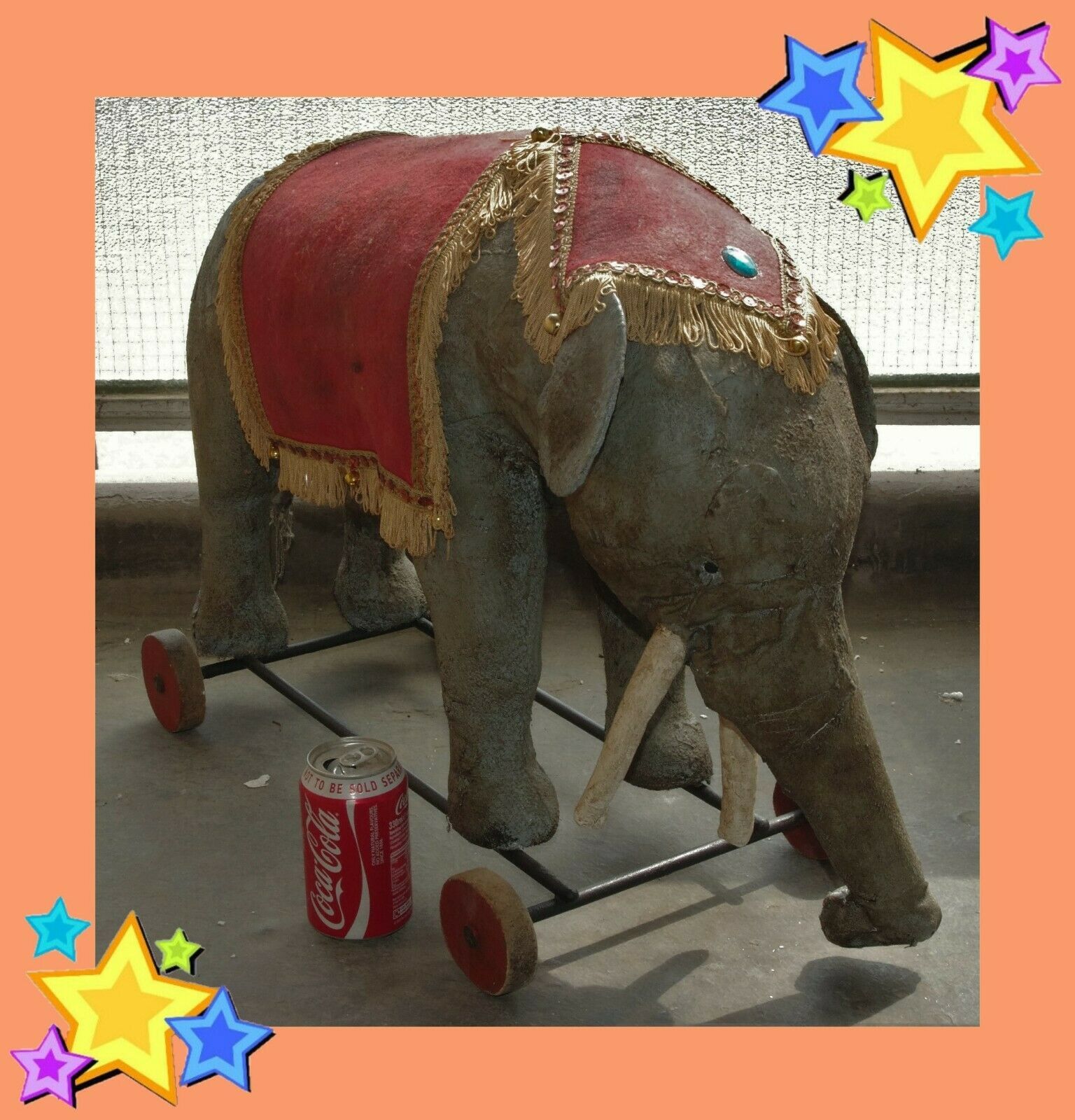 1910 stuffed elephant on wheels