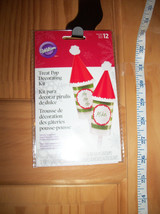 Wilton Party Supplies Set Santa Hat Christmas Holiday Treat Pop Decorati... - $9.49