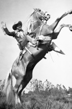 Roy Rogers riding Trigger and waving iconic pose 18x24 Poster - $23.99