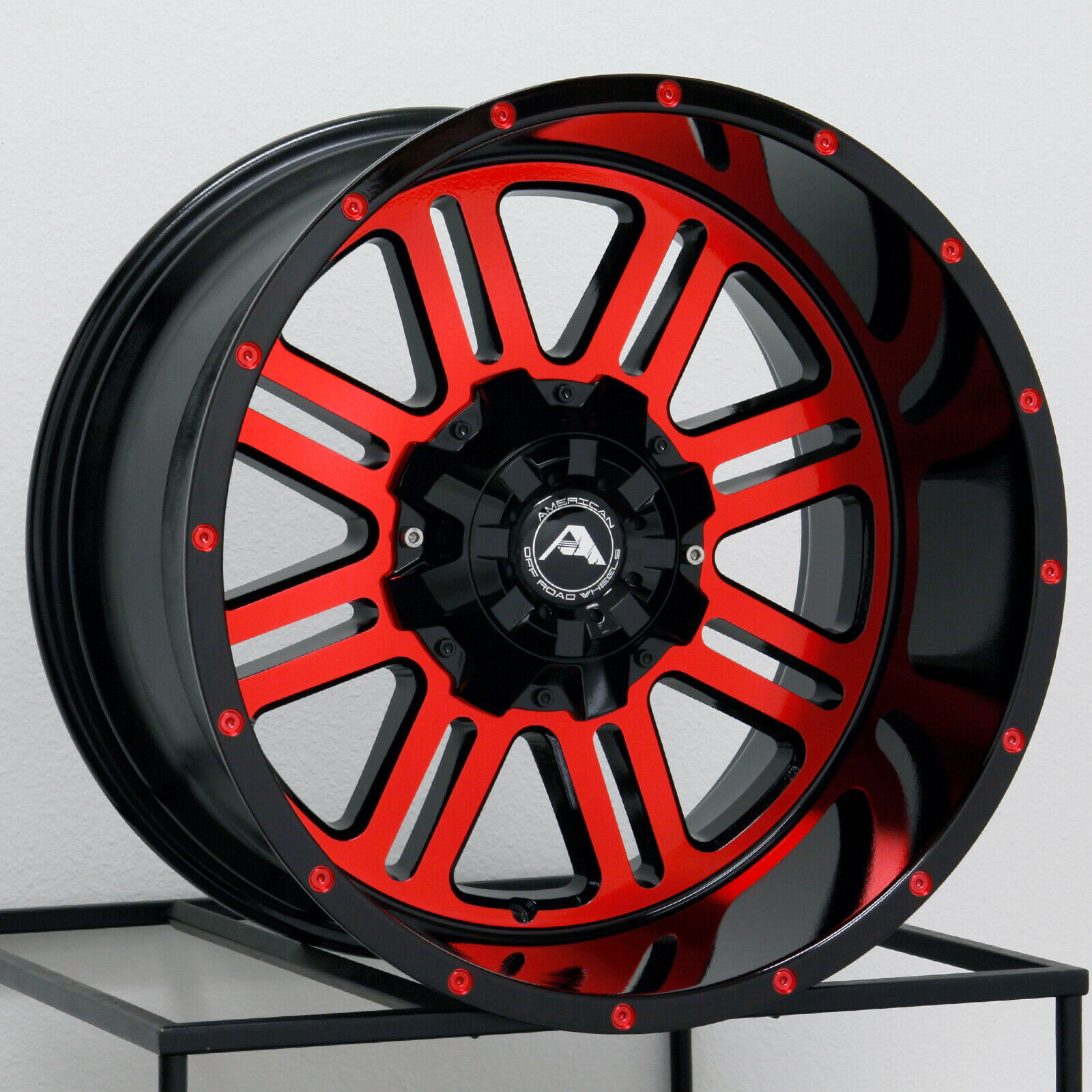 One 20x12 American OffRoad A106 5x5/5x127 44 Black Machined Red