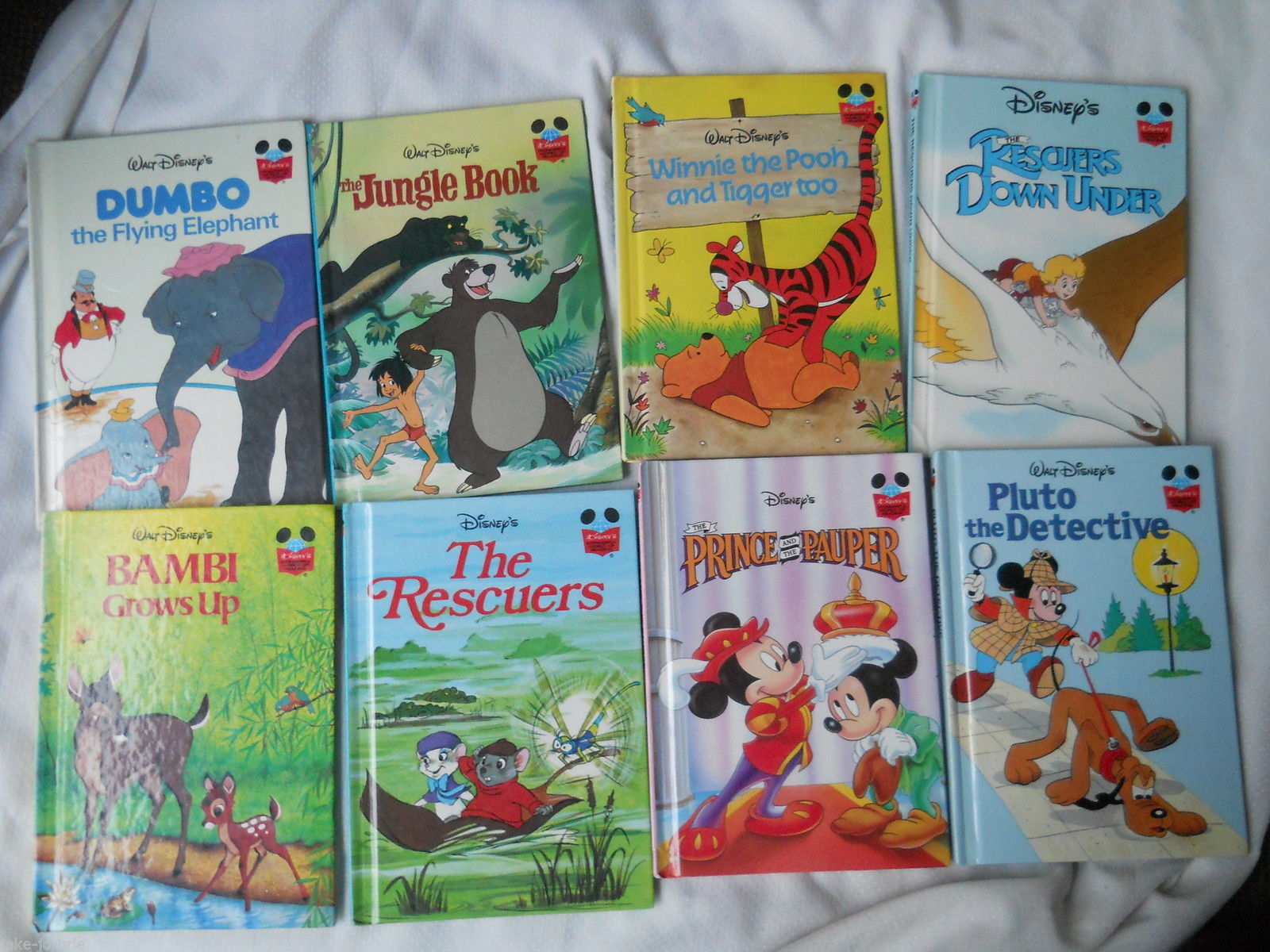 Primary image for Set of 9 Disney Winnie Pooh Bambi Rescuers Pluto Dumbo Jungle Book Prince Books