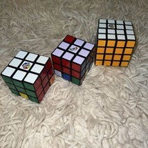 Rubik&#39;s Cube Revolution Two 3x3 and One 4X4 Puzzles LOT of 3 GAMES - $71.02