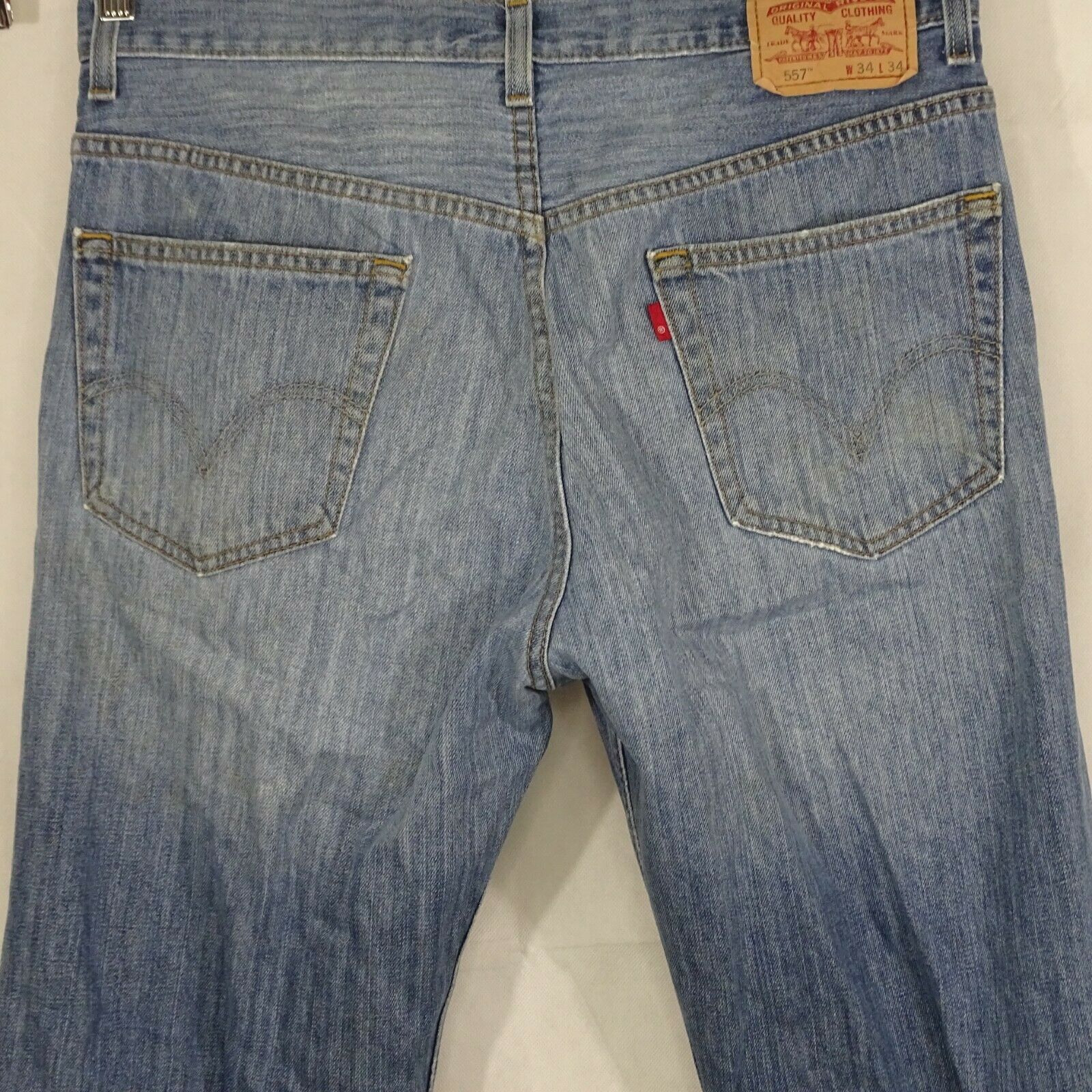 Levis 557 Relaxed Bootcut Jeans Ripped Men Size 34 x 34 Blue Medium ...
