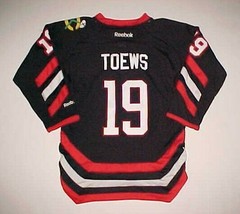 Jonathan Toews #19 Chicago Blackhawks NHL Reebok Youth Black Red Jersey S/M - $24.74