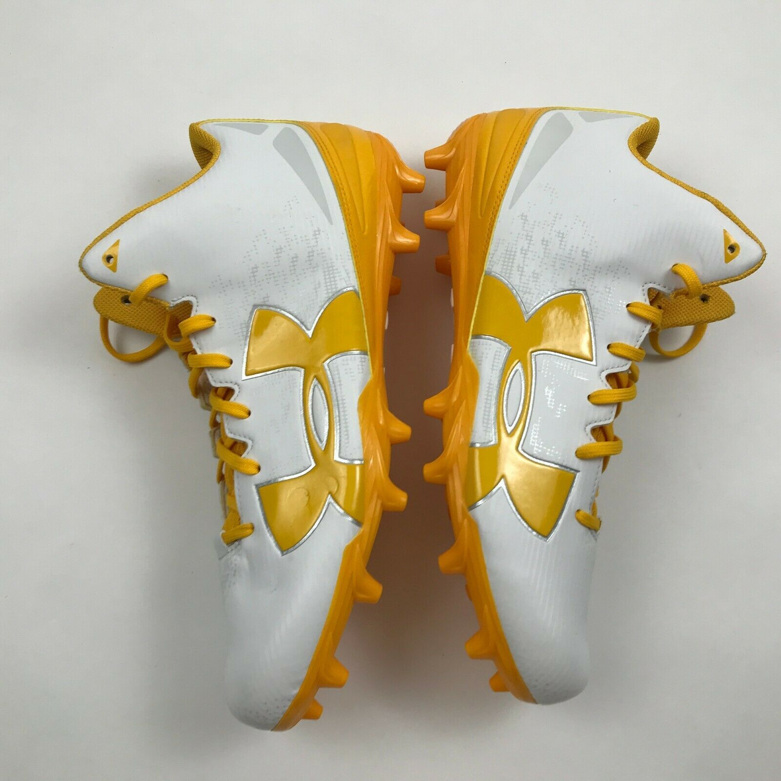 under armour black and yellow cleats