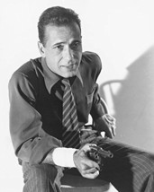 Humphrey Bogart In Shirt And Tie Smiling As He Pulls Gun 16X20 Canvas Giclee - $69.99