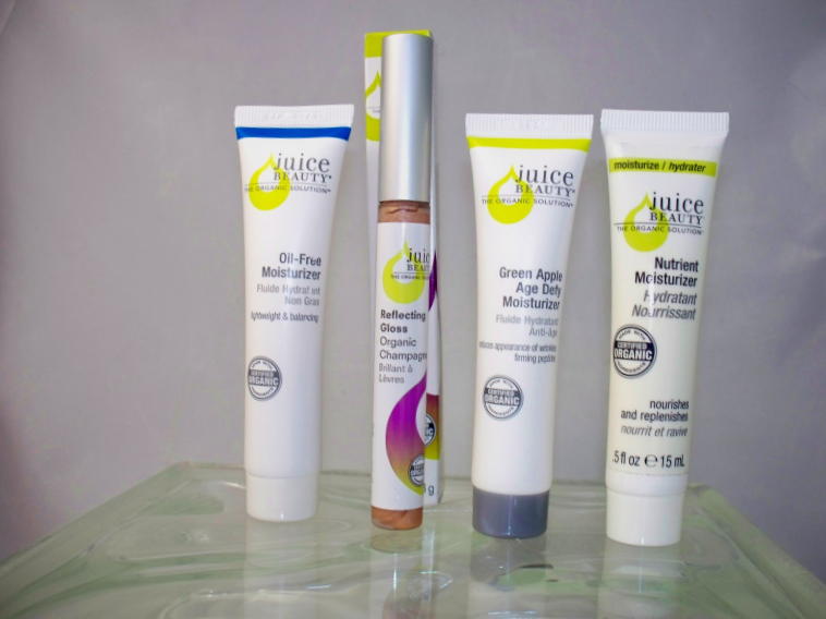 Juice Beauty Organic 4 piece travel set including Full Size Reflecting Gloss Moisturizers