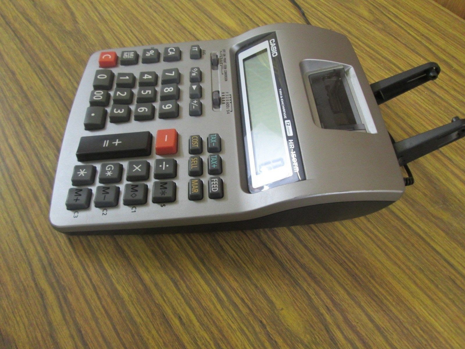 Casio HR150TM Tax & Exchange 12 Digit Printing Adding Machine