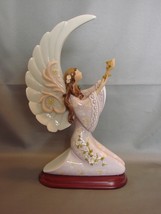 Mymicco Winged Angel Offering Up a Flower  On Wood Base - $26.90