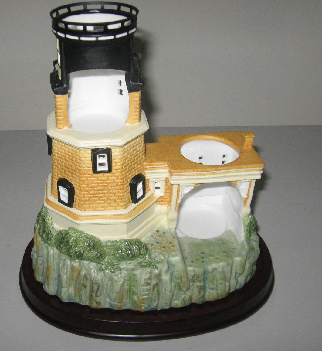 PartyLite Retired Split Rock Porcelain Lighthouse Tea light Candle