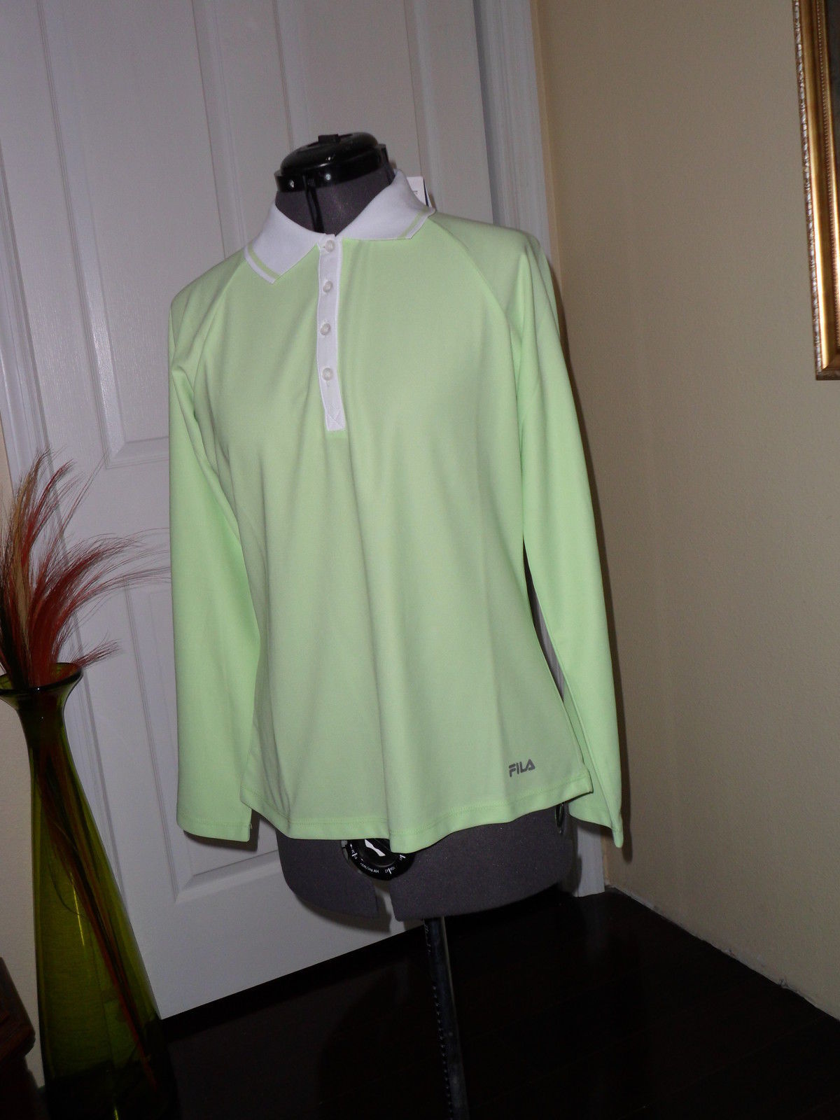 mint green fila shirt