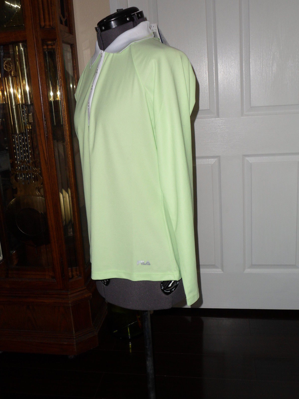 mint green fila shirt