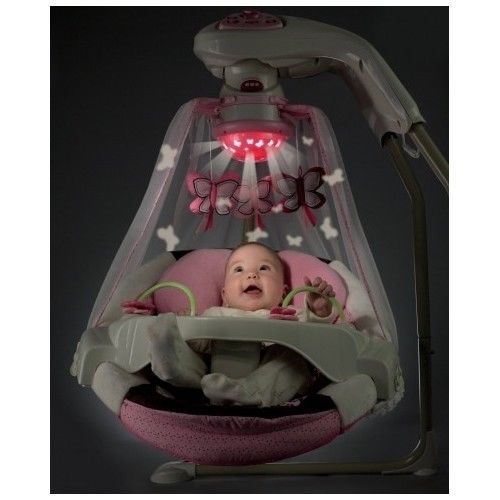 pink baby swing with butterfly lights