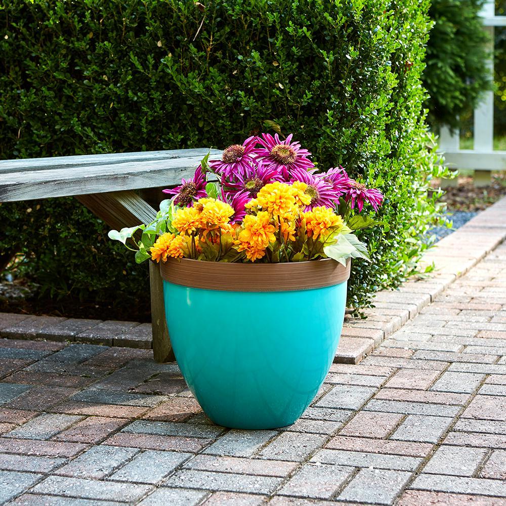 Southern Patio Devyn 14.5 In. Dia Baltic Aqua Resin Planter Planters