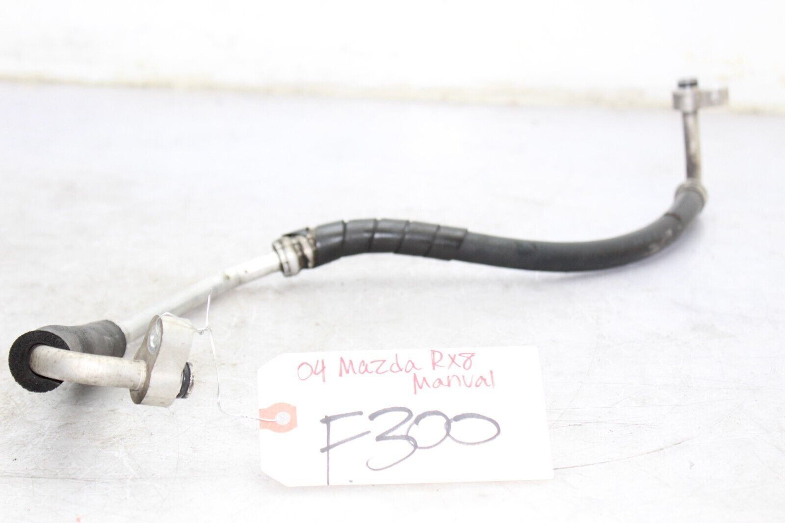0406 MAZDA RX8 MANUAL TRANSMISSION A/C Refrigerant Discharge Hose F300
