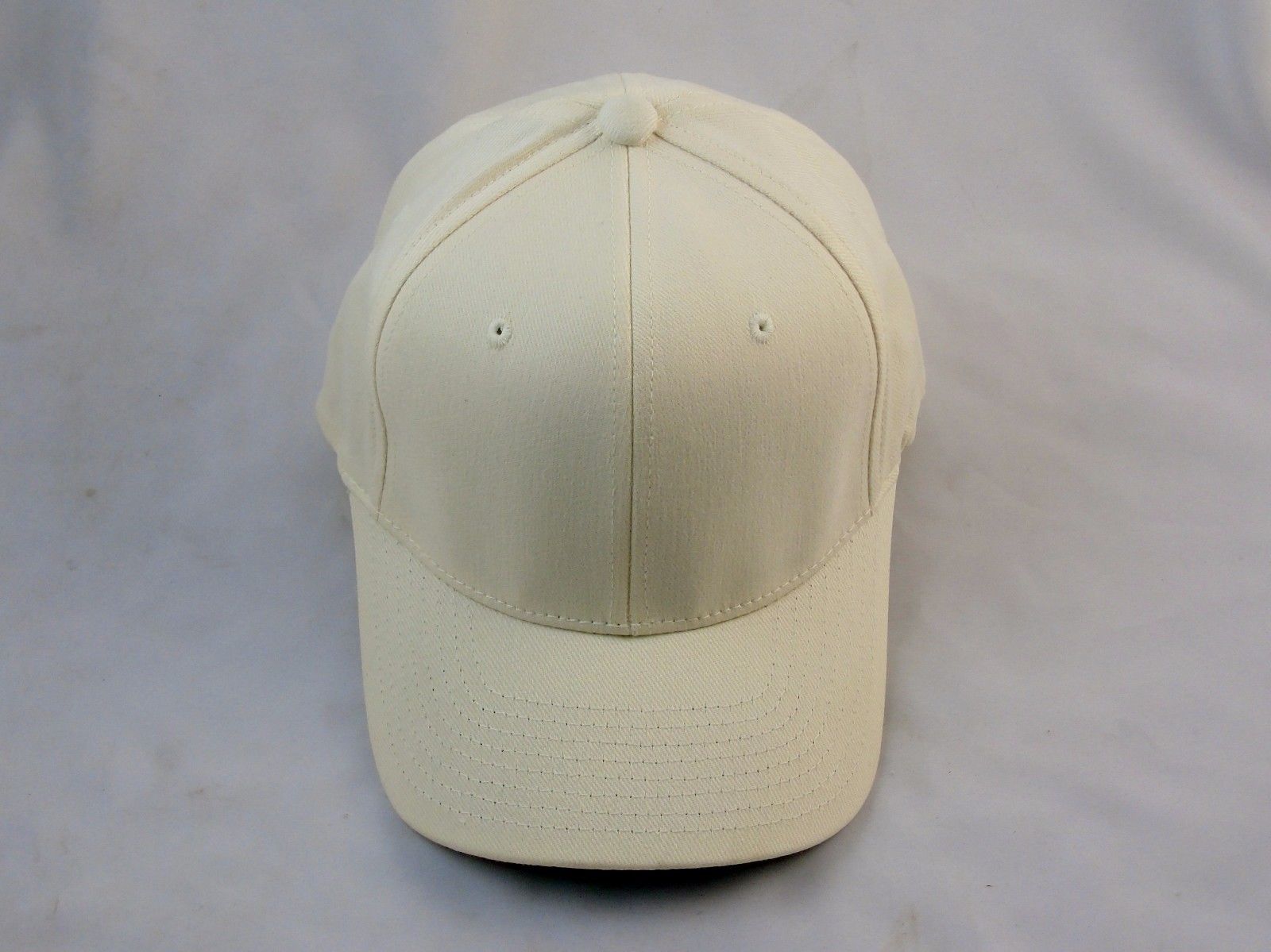 cream colored baseball hat