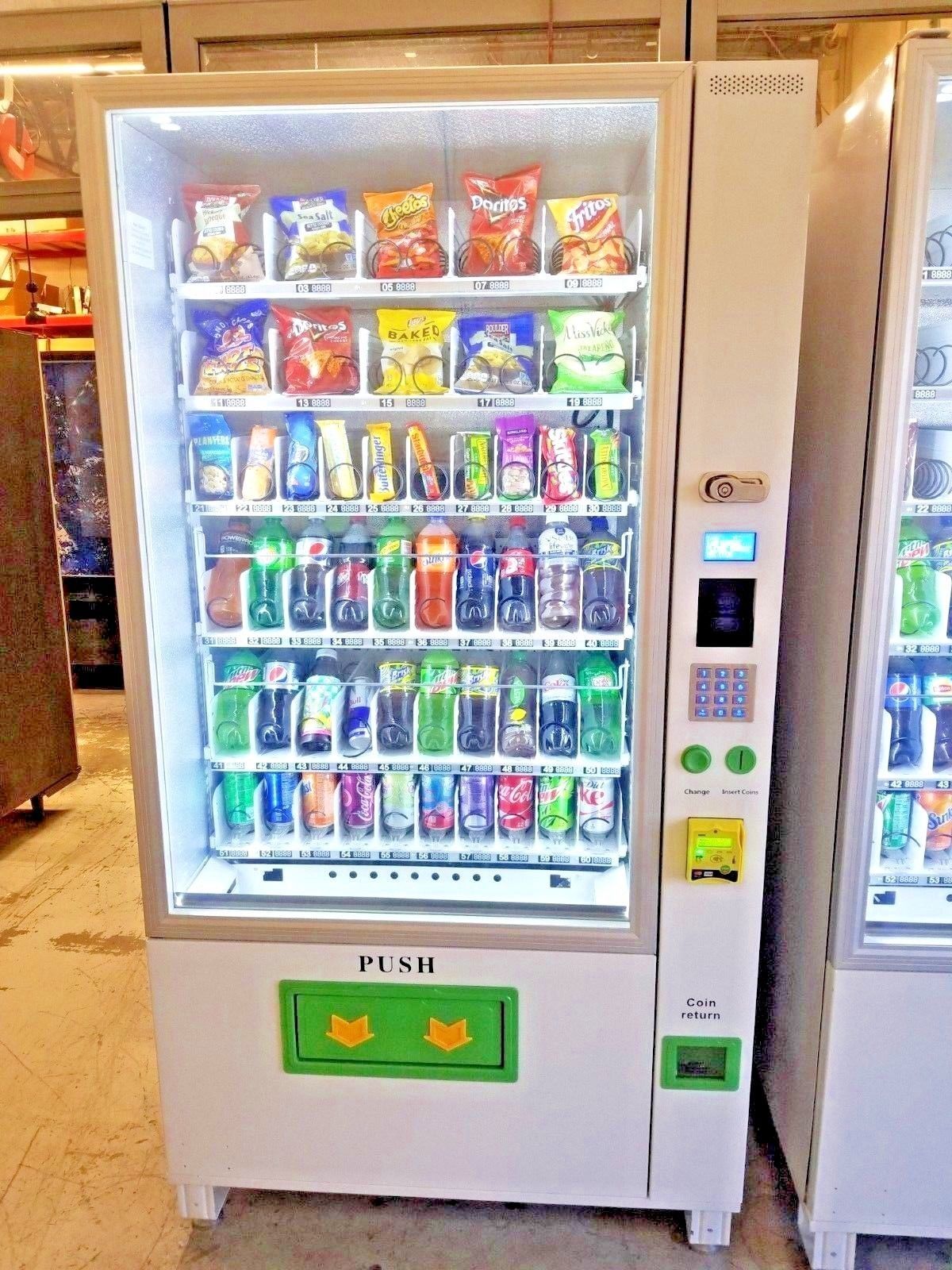 BRAND NEW COMBINATION VENDING MACHINE 1 YEAR WARRANTY COMES WITH CREDIT