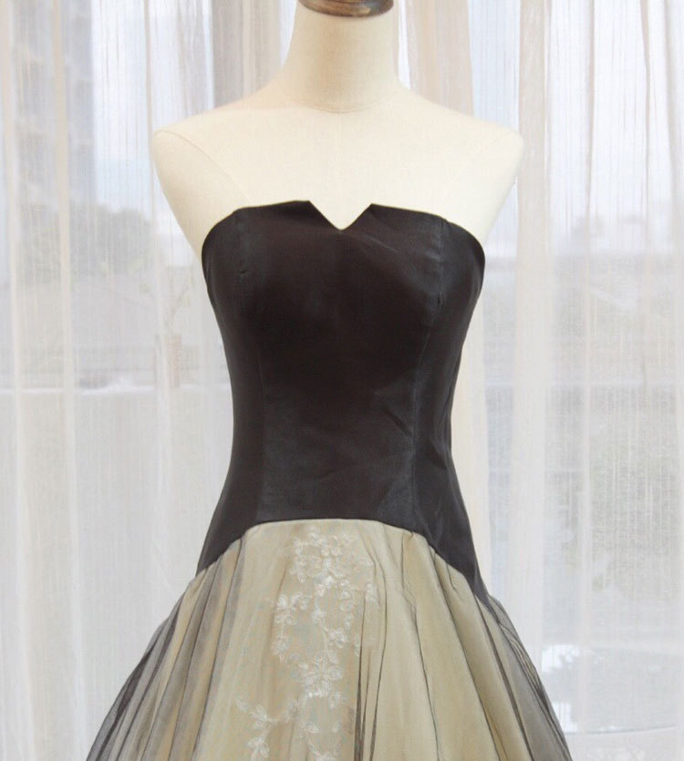 black and champagne gown
