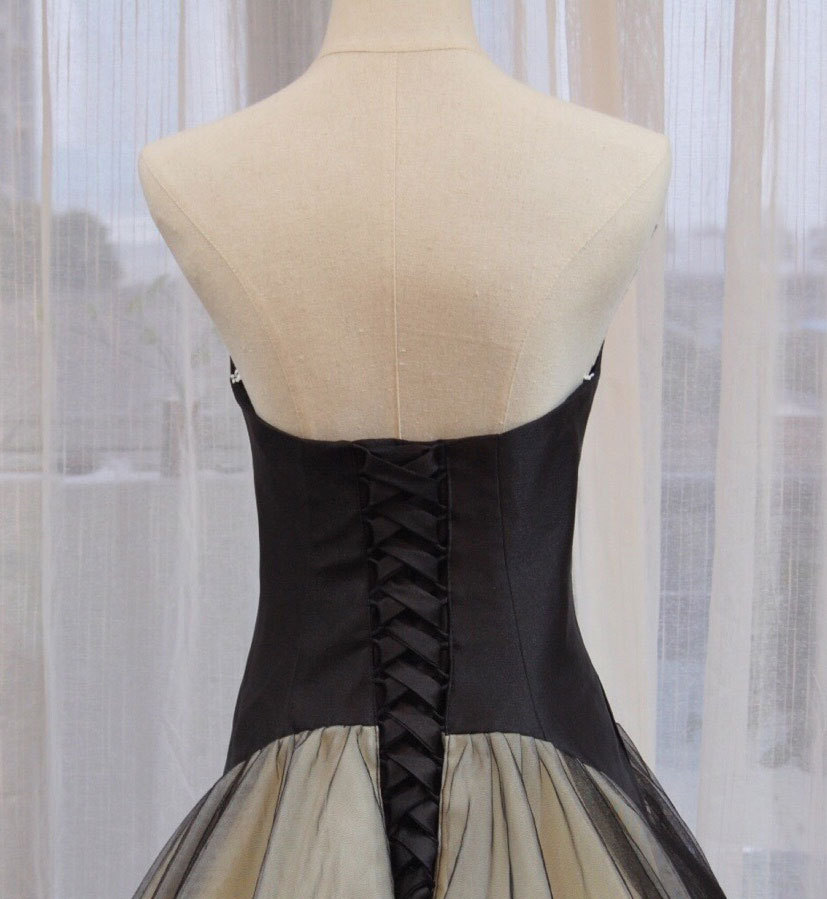 black and champagne gown