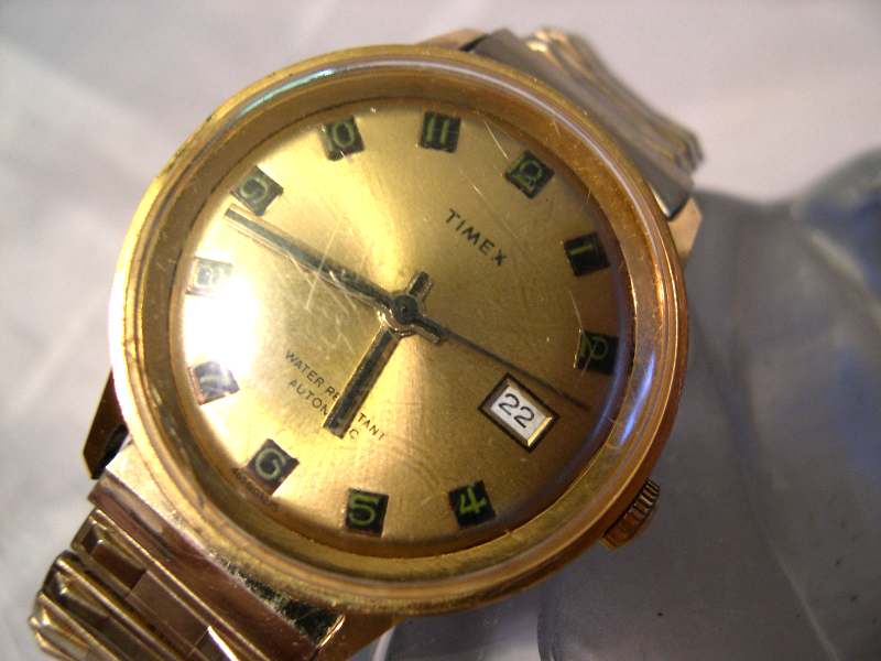 M09, Timex, Mens Gold Tone Watch, Self Winding, Date, Dust Resistant