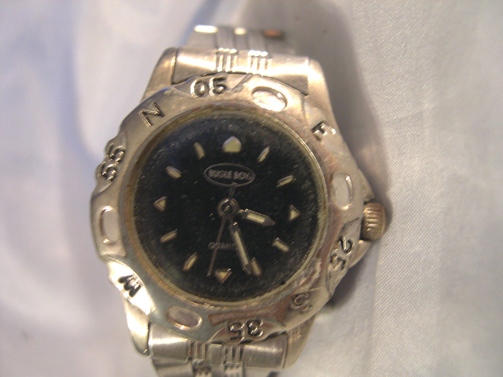 L26, Bugle Boy, Ladies Black Face Watch, 7.5" Silver Tone Link Band w/b