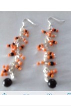 Orange black and white pierced earrings - $19.99
