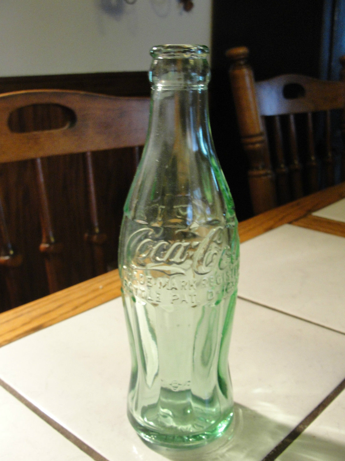 Old green glass CocaCola bottle, 6 ounces, Pat D105529, Oshkosh, Wisc