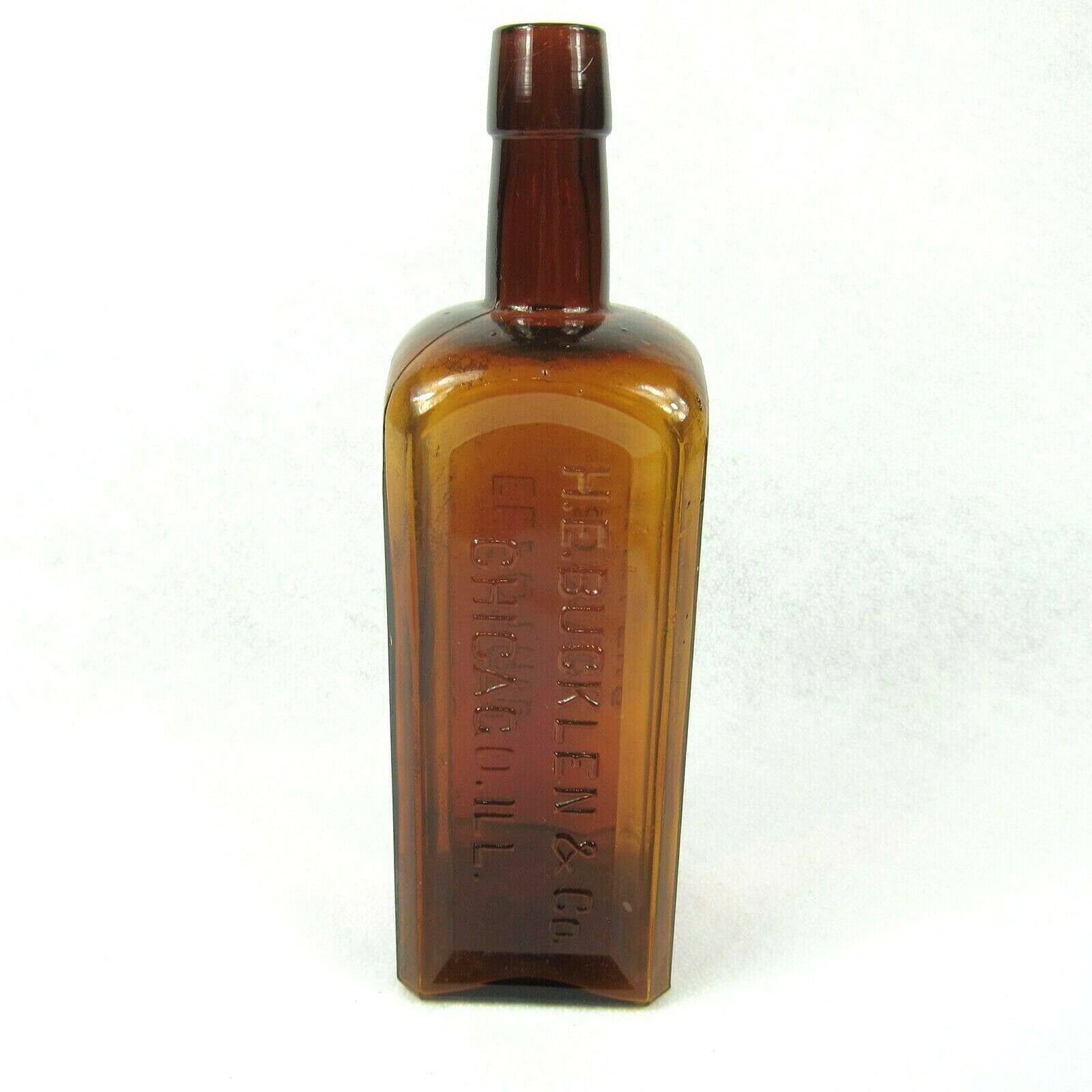 Antique 1800s Electric Bitters Glass Bottle Puce Amber Handtooled