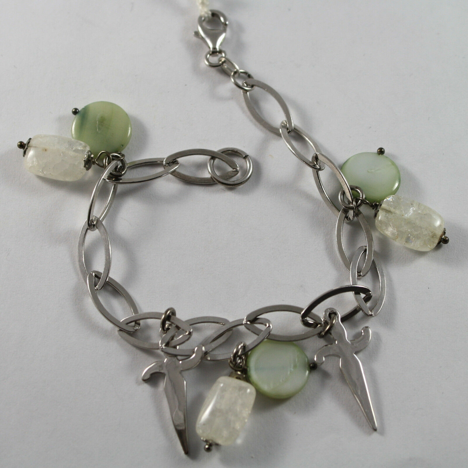 .925 RHODIUM SILVER  BRACELET WITH CRISTAL, GREEN MOTHER OF PEARL AND CHARMS - $44.80